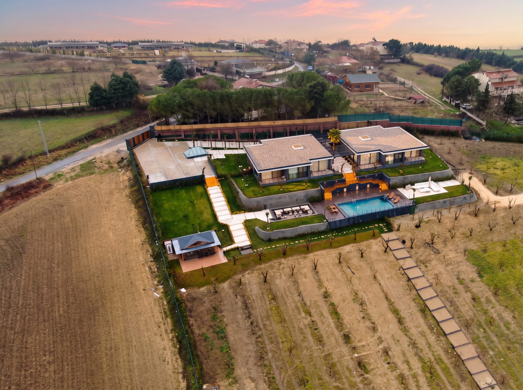 Aerial view of the two villas on the shared plot